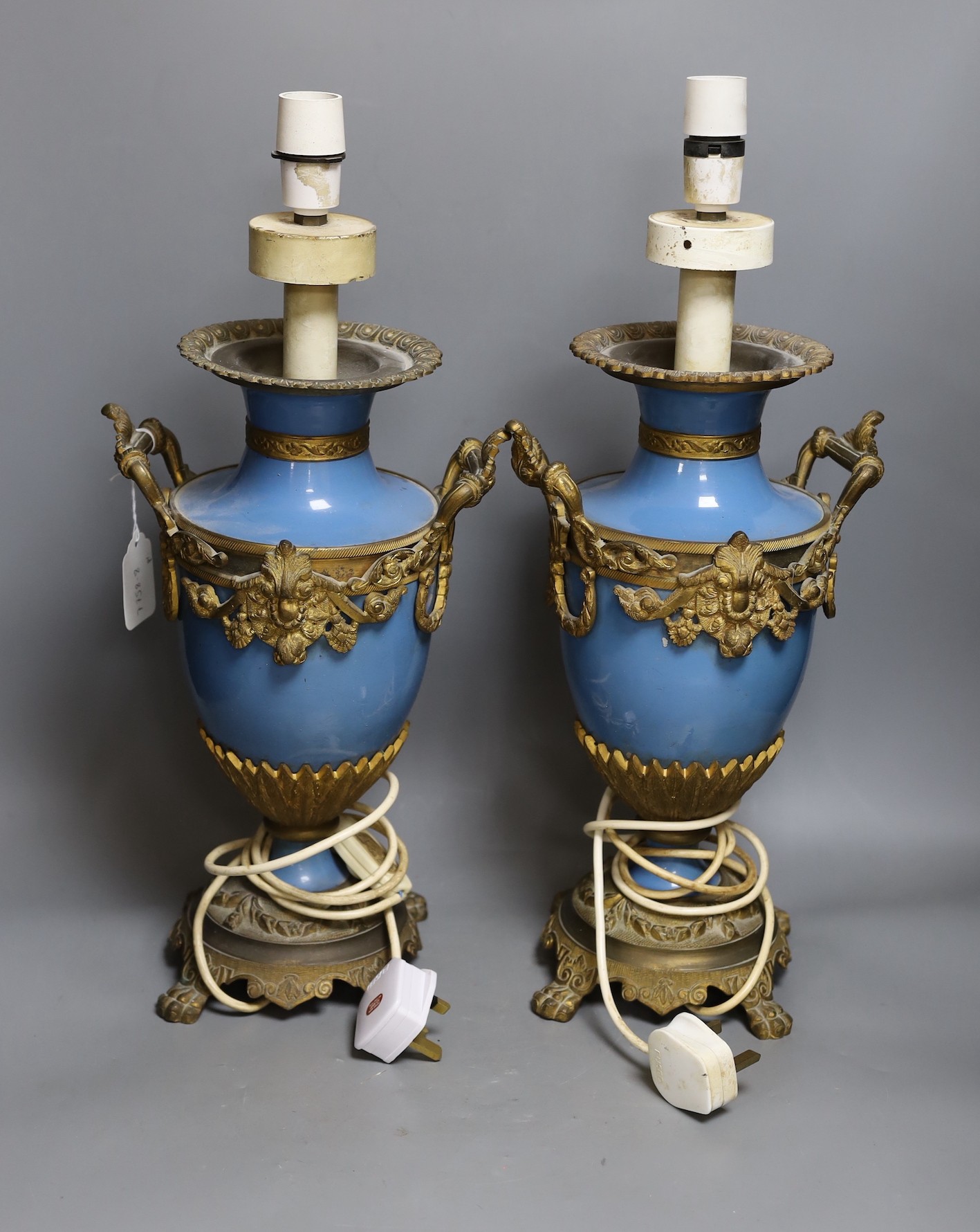 A pair of Sevres -style porcelain ormolu mounted table lamps. 50cm tall